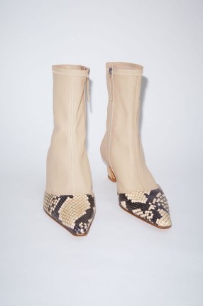Acne Studios HEELED ANKLE BOOTS in Almond beige / women’s luxury leather footwear / pointed toe with snake print detail / curved heel / womens designer clothes