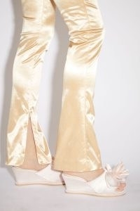 Acne Studios SATIN TROUSERS RUNWAY SHOW in Champagne beige ~ luxe clothing ~ zipped slit hems ~ luxury clothes ~ women’s designer fashion ~ shiny fluid fabric ~ zip hem detail
