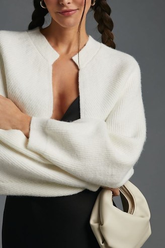 By Anthropologie Drape-Sleeve Shrug in Ivory – white knitted shrugs – cropped open front cardigan