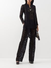 VALENTINO Floral-embroidered lace wide-leg trousers in black / women’s semi sheer clothes / womens luxury clothing