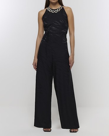 RIVER ISLAND BLACK HALTER NECK JUMPSUIT ~ sleeveless animal print evening jumpsuits ~ chunky loop chain neckline ~ women’s all-in-one party fashion - flipped