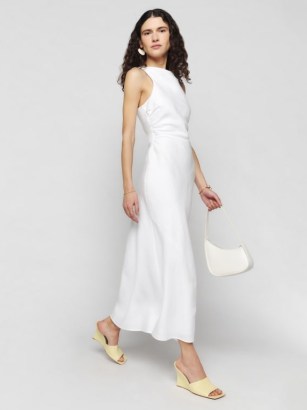 Reformation Casette Linen Dress in White / sleeveless open back midi dresses / women’s spring and summer occasion clothes / chic fashion / side ruching / ruched detail clothing - flipped