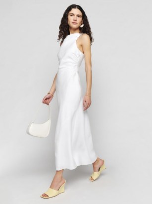 Reformation Casette Linen Dress in White / sleeveless open back midi dresses / women’s spring and summer occasion clothes / chic fashion / side ruching / ruched detail clothing