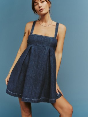 Reformation Cecil Denim Mini Dress in Ellis | sleeveless fit and flare desses | women’s luxury fashion | womens babydoll style clothes with shoulder straps | pleated flared hem | fitted bust - flipped