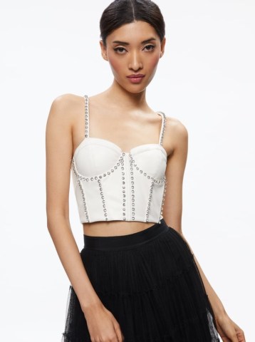 alice + olivia JEANNA BUSTIER VEGAN LEATHER CROP TOP in Off White | sleeveless fitted crystal embellished tops | cropped hem | women’s luxe fashion - flipped