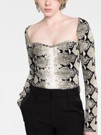 KHAITE Maddy snake-print top in white/green/black / long sleeve sweetheart neckline tops / women’s designer fashion with animal prints / womens luxury clothing