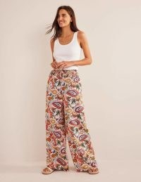 Boden Linen Shirred Waist Trousers in Multi, Paradise Paisley / women’s foral clothes / wide leg / shirred waist detail