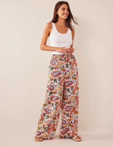 Boden Linen Shirred Waist Trousers in Multi, Paradise Paisley / women’s foral clothes / wide leg / shirred waist detail - flipped