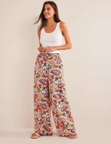 Boden Linen Shirred Waist Trousers in Multi, Paradise Paisley / women’s foral clothes / wide leg / shirred waist detail