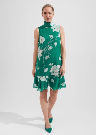 HOBBS MADELINE DRESS in GREEN IVORY – women’s sleeveless high neck summer occasion dresses – feminine floral event clothes – flippy tiered hem – floaty ruffled hemline