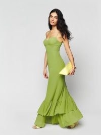 Reformation Petites Fallon Dress in Avocado ~ green strappy maxi dresses ~ ruffled tiered hem detail ~ skinny shoulder strap occasion clothes ~ women’s event clothing ~ fitted bodice and waist with a mermaid silhouette ~ spaghetti straps ~ sweetheart neckline