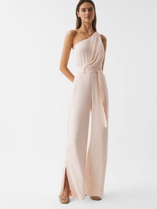 REISS ELIZA OFF-THE-SHOULDER JUMPSUIT NUDE ~ pale pink asymmetric occasion jumpsuits ~ women’s luxury evening evening all-in-one fashion ~ elegant one shoulder party clothes ~ tie waist ~ 70s inspired glamour - flipped