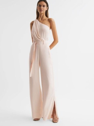 REISS ELIZA OFF-THE-SHOULDER JUMPSUIT NUDE ~ pale pink asymmetric occasion jumpsuits ~ women’s luxury evening evening all-in-one fashion ~ elegant one shoulder party clothes ~ tie waist ~ 70s inspired glamour