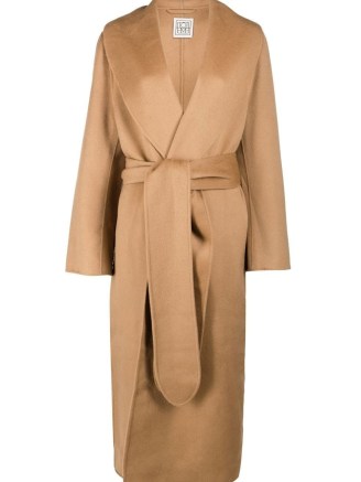 Selena Gomez’ longline oversized camel coat, TOTEME Robe belted wool coat. Worn with chunky black ankle boots. out in New York, March 2023 | celebrity street style | light brown tie waist coats | what celebrities wear - flipped