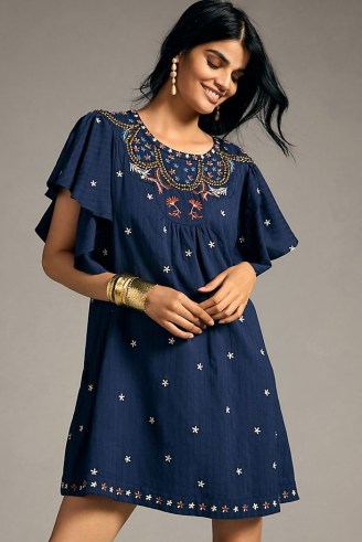 By Anthropologie Crewneck Embroidered Tunic Dress in Navy / women’s dark blue floral flutter sleeve dresses / feminine summer clothes / open back detail / wide angel sleeves