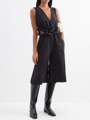 JIL SANDER Black Sequinned side-cutout matte-satin jumpsuit – sleeveless cropped cut out jumpsuits – women’s luxury clothes – womens glamorous designer clothing - flipped