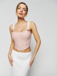 Reformation Brigitta Linen Top in Blush Check | curved hem bustier tops | lace shoulder straps | fitted fashion | pink and white check print bustiers | feminine clothes