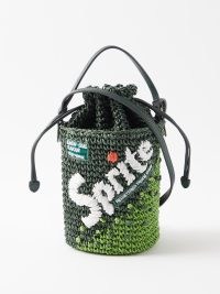 ANYA HINDMARCH Green Sprite woven-paper cross-body bag – cylindrical tonal coloured bags – slogan print crossbody – small top handle handbags – summer accessories