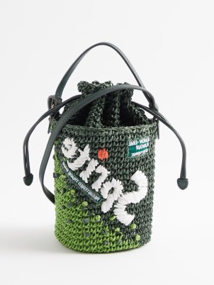 ANYA HINDMARCH Green Sprite woven-paper cross-body bag – cylindrical tonal coloured bags – slogan print crossbody – small top handle handbags – summer accessories - flipped
