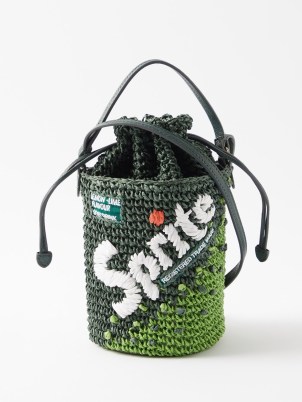 ANYA HINDMARCH Green Sprite woven-paper cross-body bag – cylindrical tonal coloured bags – slogan print crossbody – small top handle handbags – summer accessories