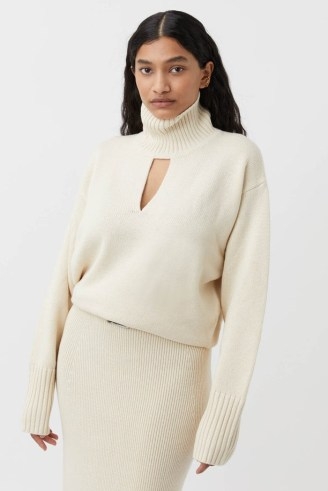 CAMILLA AND MARC Kalina Knit Cutout Turtleneck in Cream.| women’s high neck keyhole cut out sweater | womens luxury knitwear | front cutout jumpers | luxe thumb hole sweaters - flipped