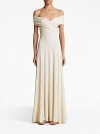 KHAITE The Bruna off-shoulder maxi dress in neutral – long length bardo dresses – women’s luxury occasion clothing