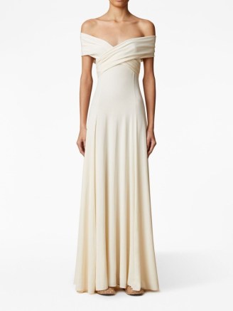 KHAITE The Bruna off-shoulder maxi dress in neutral – long length bardo dresses – women’s luxury occasion clothing - flipped