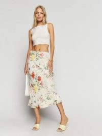 Reformation Layla Skirt in Etude – white floral bias cut slip skirts