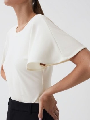 REISS CONNIE FLUID SLEEVE T-SHIRT IVORY / short flared sleeve T-shirts / women’s occasion tee / minimalist evening tops / open V-back / womens dress up or down clothes