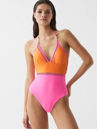 REISS RAY COLOURBLOCK HALTER SWIMSUIT ORANGE/PINK – plunging halterneck swimsuits / colour block swimwear - flipped