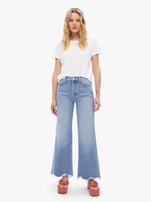 MOTHER The Tomcat Roller Chew in Look Before You Leap ~ women’s chewed hem jeans ~ womens vintage blue wash clothing with subtle fading and whiskering ~ wide leg with raw hems ~ retro blue denim fashion