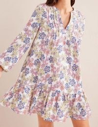 Boden Tiered Linen Mini Dress in Ivory, Botanic Tavern – women’s floral summer dresses – ruffled hem
