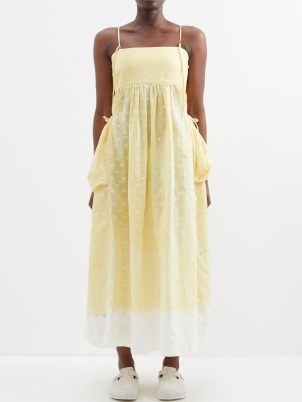 STORY MFG. Bay polka-dot organic-cotton midi dress / yellow strappy spot print summer dresses / womens skinny shoulder strap clothes / womens clothing with an oversized back bow - flipped