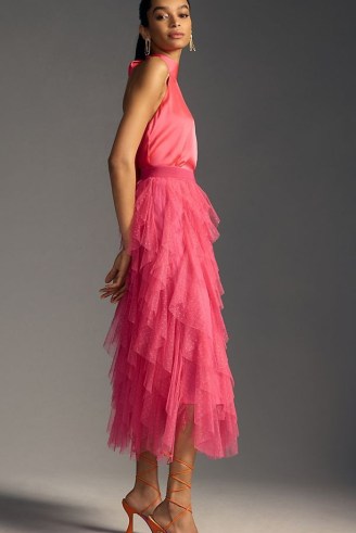 Tesia Ruffled Tulle Midi Skirt in Raspberry | pink layered tiered skirts | semi sheer net clothing