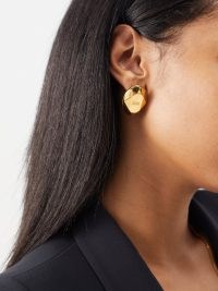 ALEXANDER MCQUEEN Logo-engraved stud earrings / women’s large designer studs