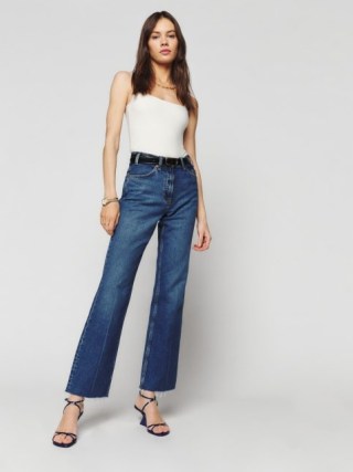 Reformation Hill Mid Rise Kick Flare Jeans in Araceli – women’s blue denim clothes – mid rise – reaxed fit with straight leg - flipped