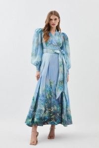 Lydia Millen Silk Cotton Scenic Floral Maxi Dress – tonal blue balloon sleeve tie waist dresses – feminine occasion clothing – romantic summer event clothes – romance