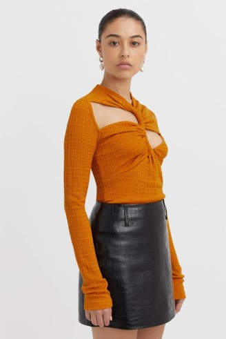 CAMILLA AND MARC Nemesia Textured Long Sleeve Top in Burnt Orange ~ textured tops with asymmetric cut outs ~ asymmetrical fashion ~ cutout clothing ~ twist detail clothes - flipped