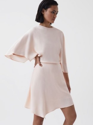 REISS CHRISTY CAPE SLEEVE ASYMMETRIC MINI DRESS in NUDE – asymmetrical evening clothes – floaty wide sleeve occasion dresses - flipped