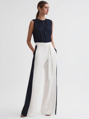 Reiss IVY WIDE LEG SIDE STRIPE JUMPSUIT NAVY/WHITE – women’s elegant sleeveless colour block jumpsuits – chic occasion clothes – womens sophistcated event clothing – belted self tie waist