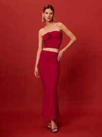 Reformation Adalynn Knit Two Piece in Cherry – red strapless crop top and column maxi skirt – floral rosette bandeau tops and skirts – women’s fashion sets – floral detail boob tube – clothing co-ords – on-trend summer co-ord