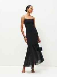 Reformation Aimee Dress in Black – strappy fitted evening dresses with a sheer fishtail hem – asymmetric hemline occasion fashion – chic evening clothes – elegant event wear