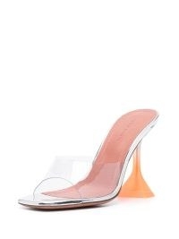 Amina Muaddi Lupita Glass 100mm leather mules in silver tone / orange – flared martini heels – clear strap mule sandals – transparent evening sandal
