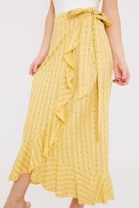 CARYS WHITTAKER YELLOW FLORAL PRINT WRAP MIDAXI SKIRT – frill trim side tie skirts – summer fashion