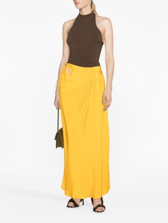 Christopher Esber Triqueta gathered maxi skirt in mango orange – silky long length occasion skirts – silky summer event fashion – chic cut out clothing