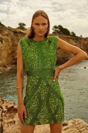 KAREN MILLEN Crystal Embellished Strong Shoulder Mini Dress in Green / sleeveless sequinned party dresses / shimmering occasionwear / glamorous evening event clothes / shimmering occasion fashion / padded shoulders for a little structure / cut out back clothing - flipped