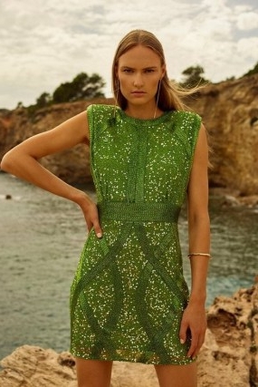 KAREN MILLEN Crystal Embellished Strong Shoulder Mini Dress in Green / sleeveless sequinned party dresses / shimmering occasionwear / glamorous evening event clothes / shimmering occasion fashion / padded shoulders for a little structure / cut out back clothing