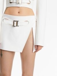 Dion Lee Interloop mini skirt in white – short thigh length slit hem skirts – women’s edgy clothing – front buckle detail