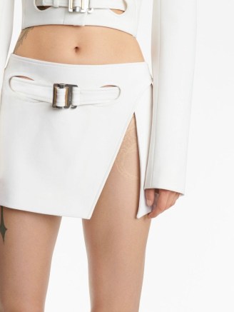 Dion Lee Interloop mini skirt in white – short thigh length slit hem skirts – women’s edgy clothing – front buckle detail