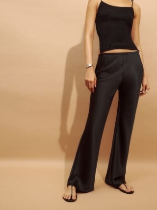 Reformation Gale Satin Mid Rise Bias Pant in Black / women’s silky flared trousers / luxe flares
